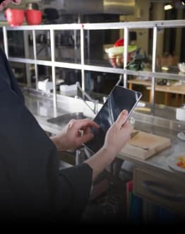 Manual order processing slowing kitchen operations during peak hours